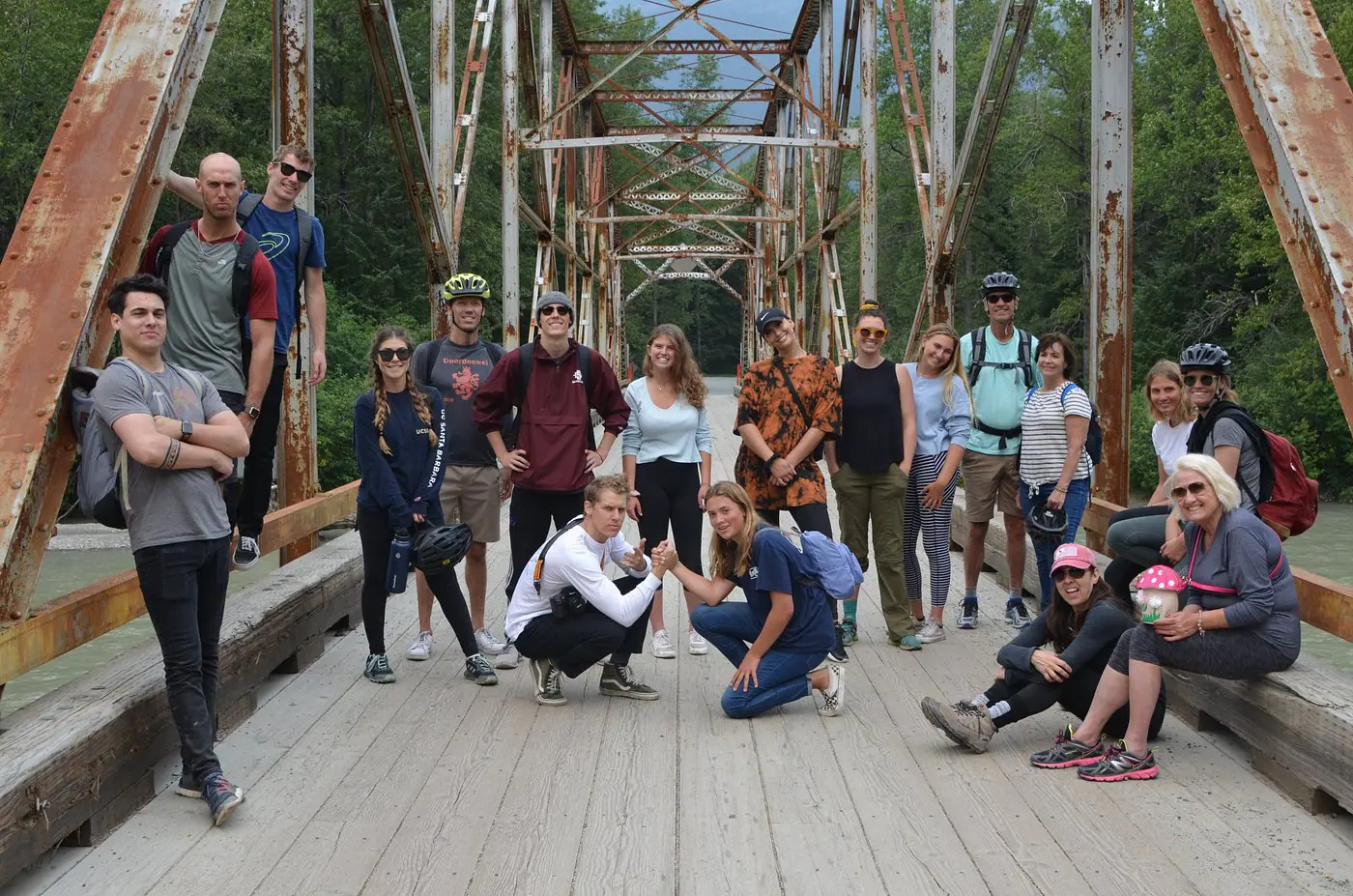 family on taiya river bridge